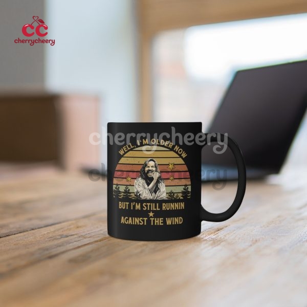 Well I'm Older Now But I'm Still Runnin Against The Wind Black Mug