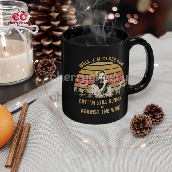 Well I’m Older Now But I’m Still Runnin Against The Wind Black  Mug
